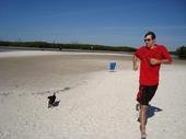 Petey runs on beach